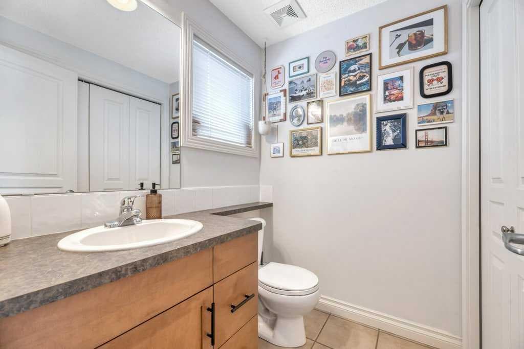 13, 148 Rockyledge View NW