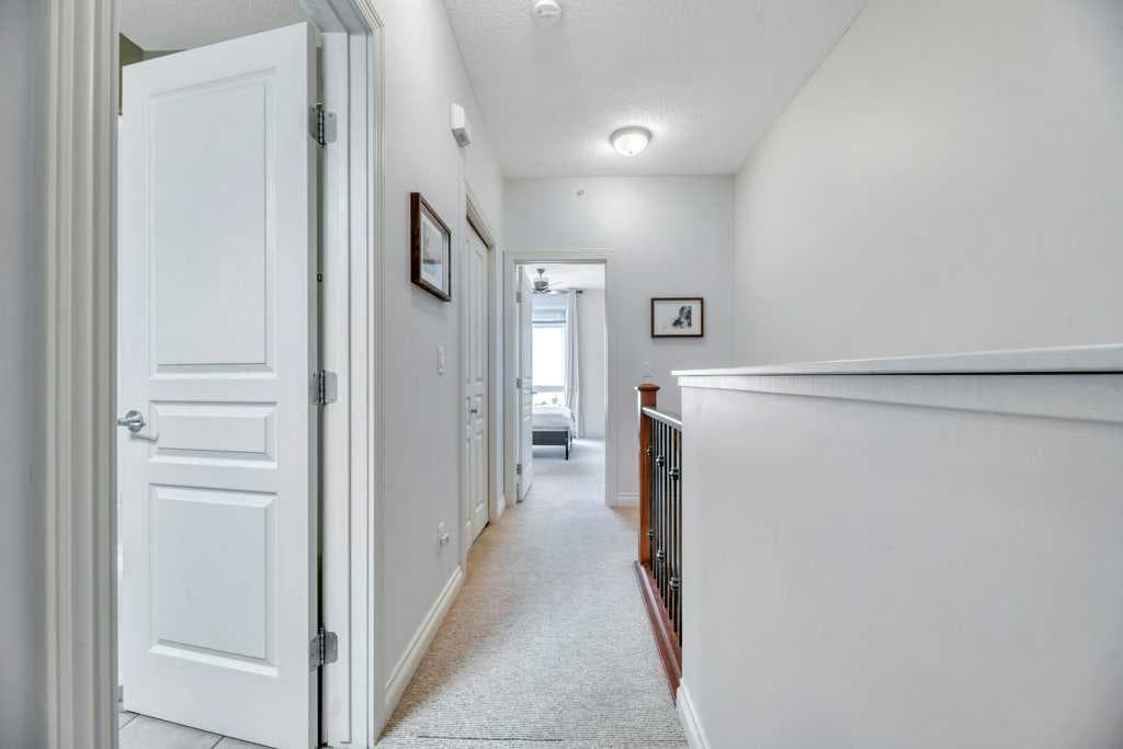 13, 148 Rockyledge View NW
