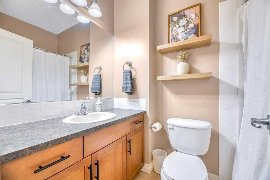 13, 148 Rockyledge View NW