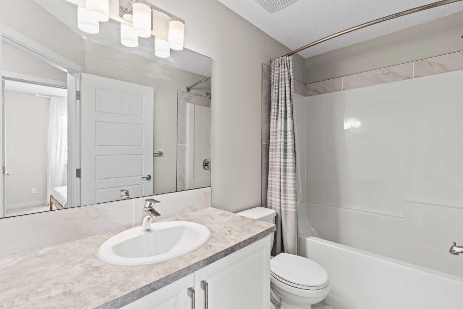 310, 32 Red Embers Parade NE