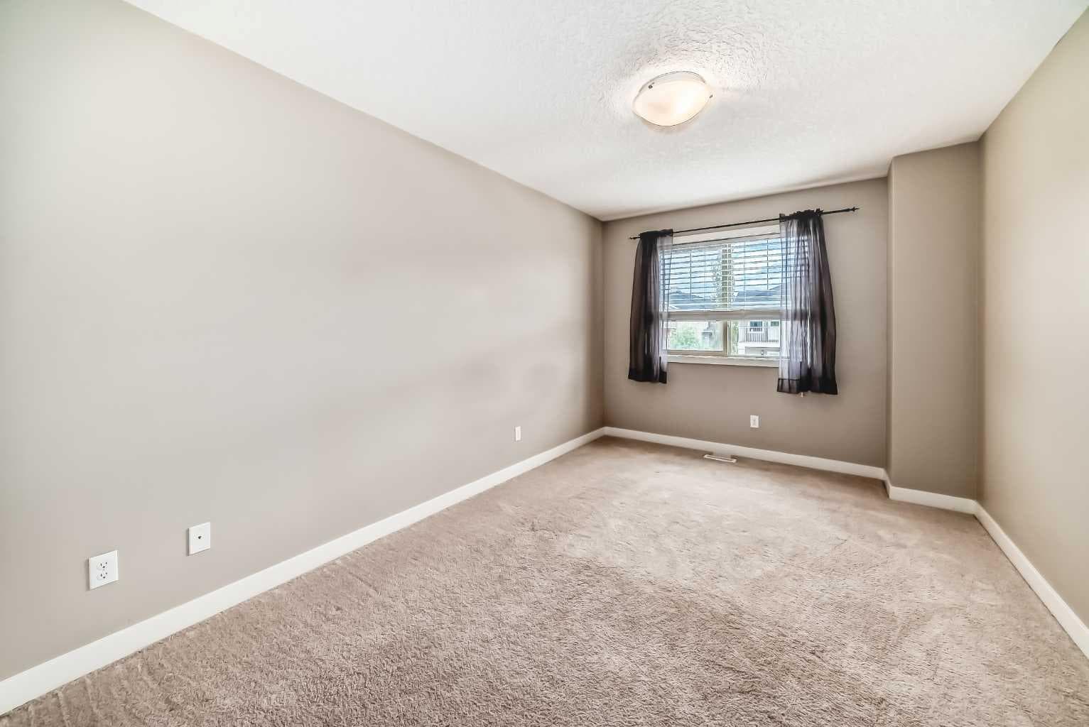 303, 250 Sage Valley Road NW