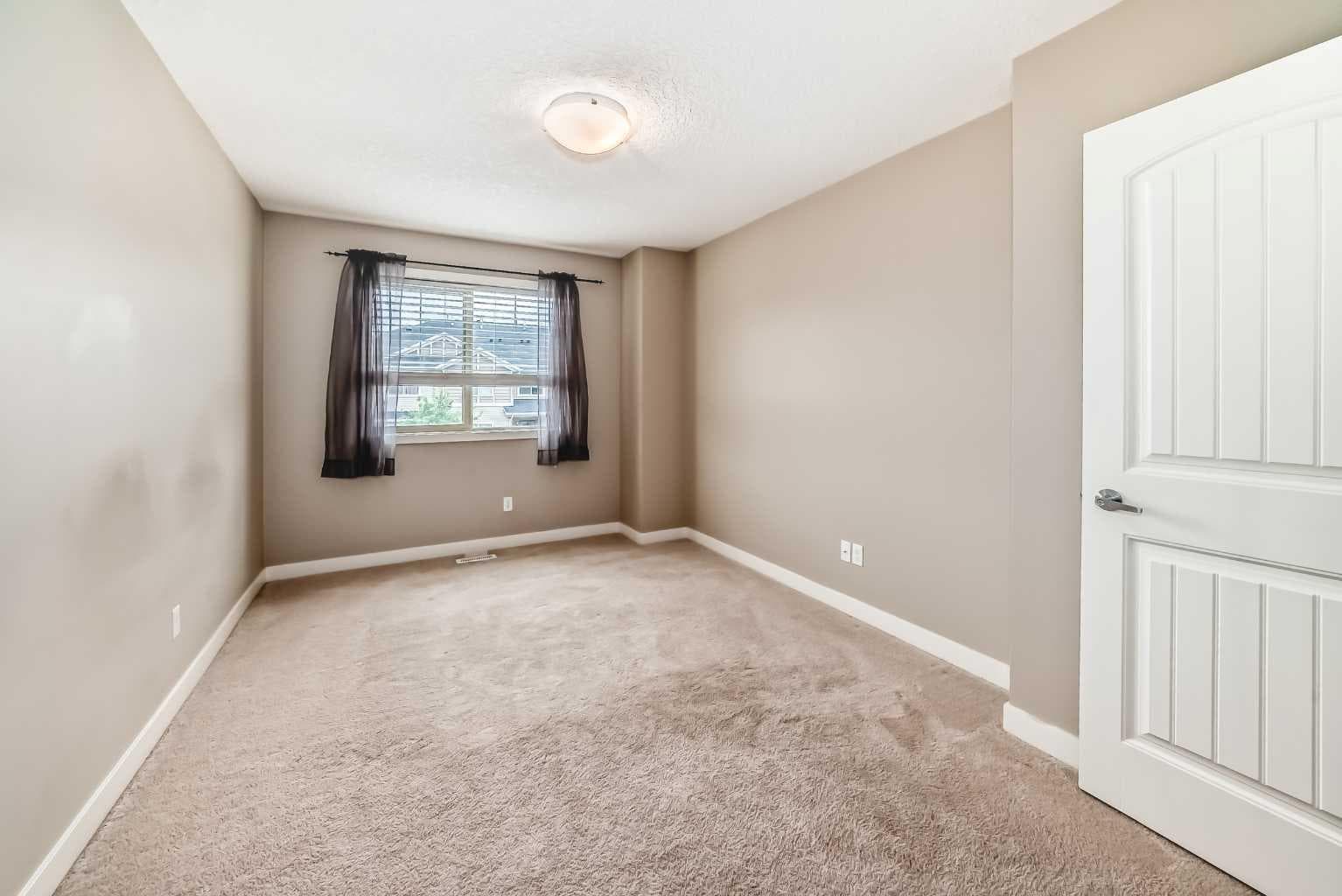 303, 250 Sage Valley Road NW