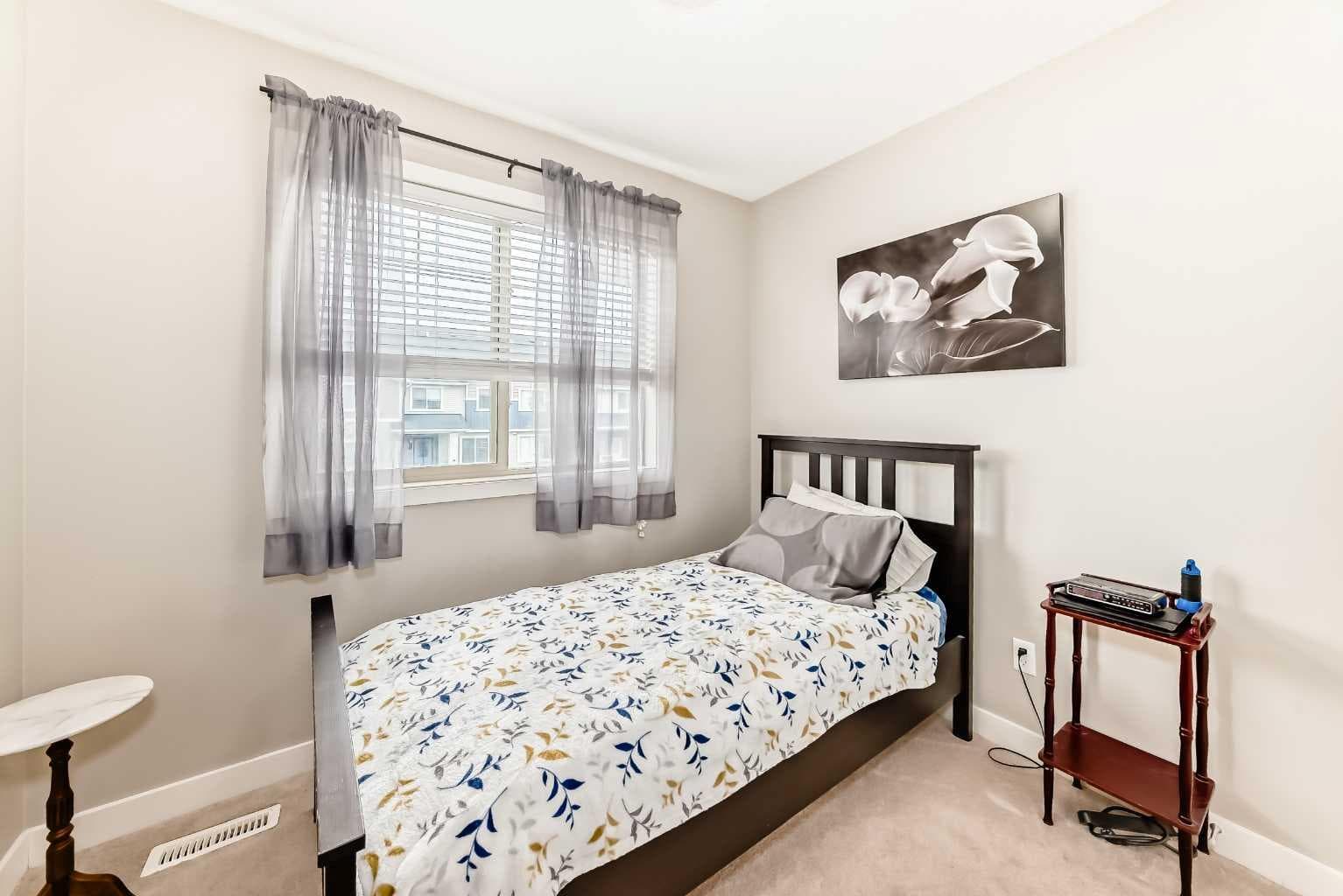303, 250 Sage Valley Road NW