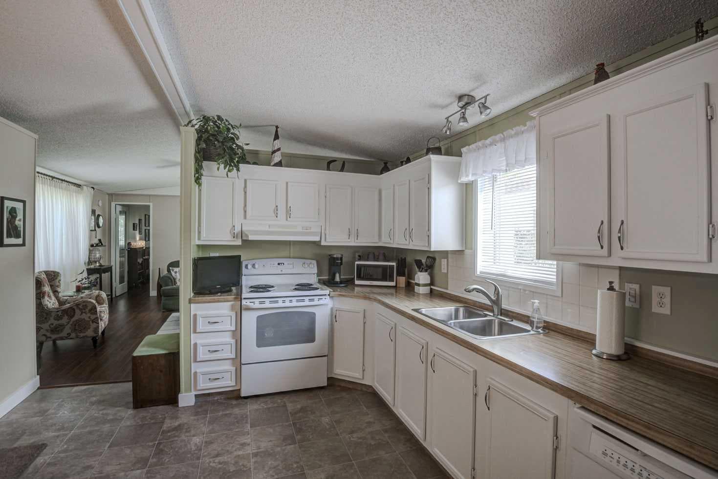 221, 99 Arbour Lake Road NW