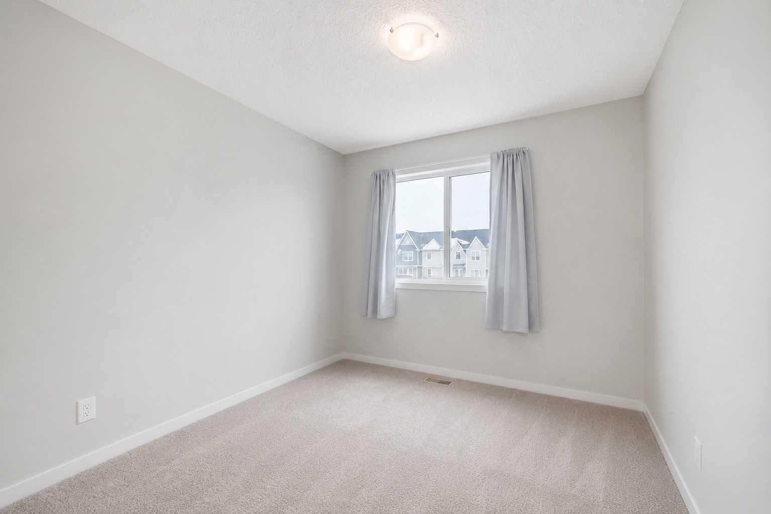 806, 32 Red Embers Parade NE