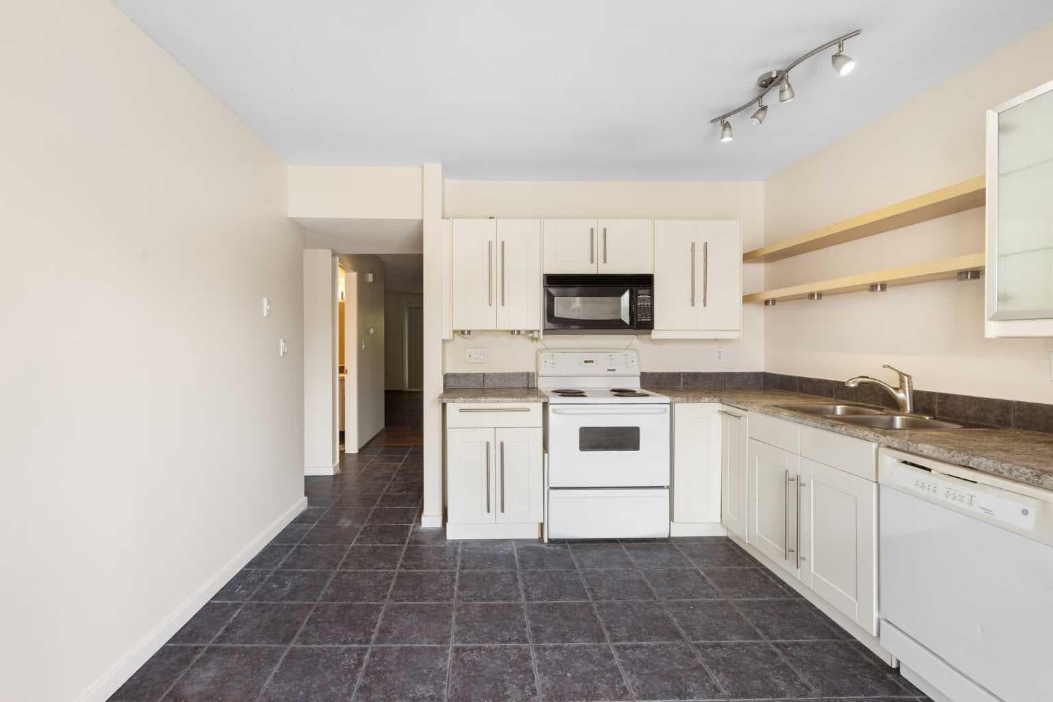 303, 1305 Glenmore Trail SW