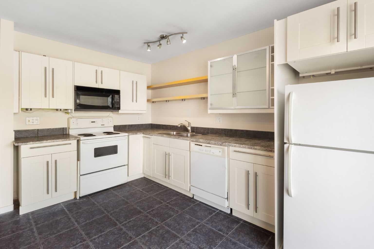 303, 1305 Glenmore Trail SW