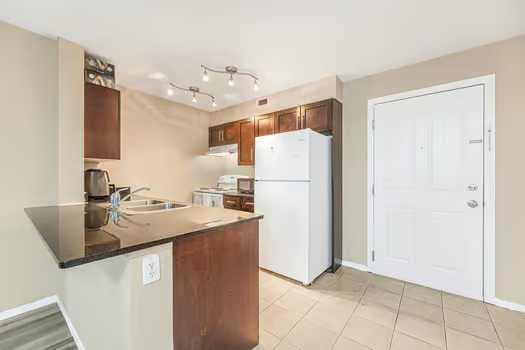 215, 355 Taralake Way NE