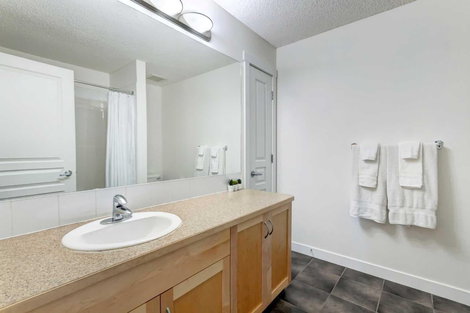1222, 211 Aspen Stone Boulevard SW