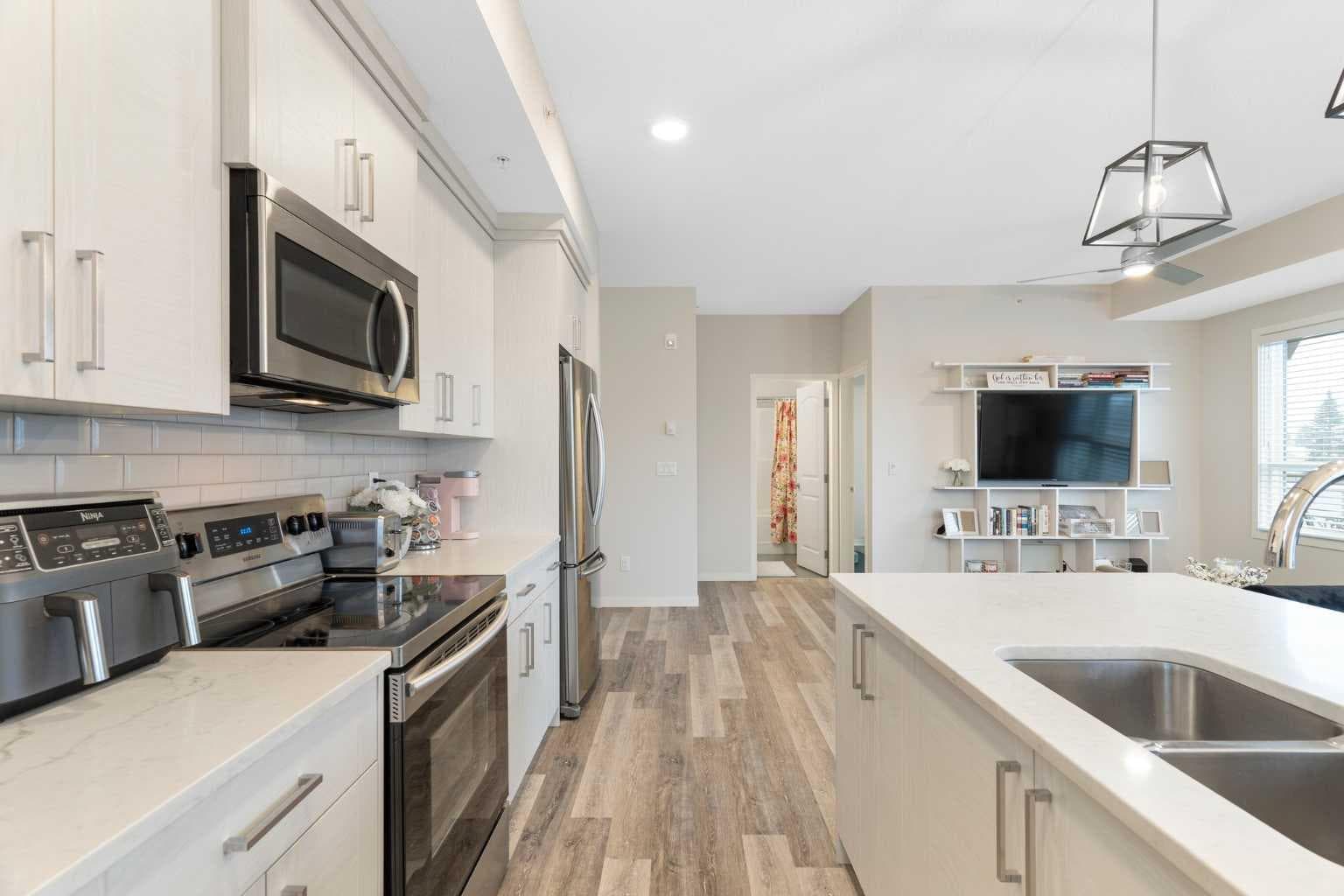 402, 300 Harvest Hills Place NE