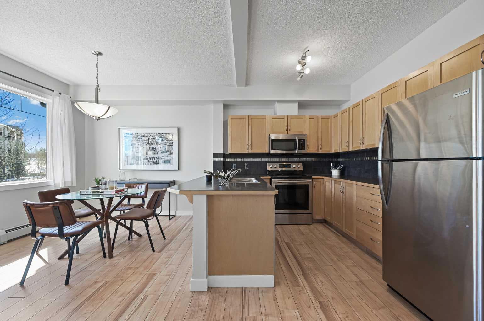 2205, 211 Aspen Stone Boulevard SW