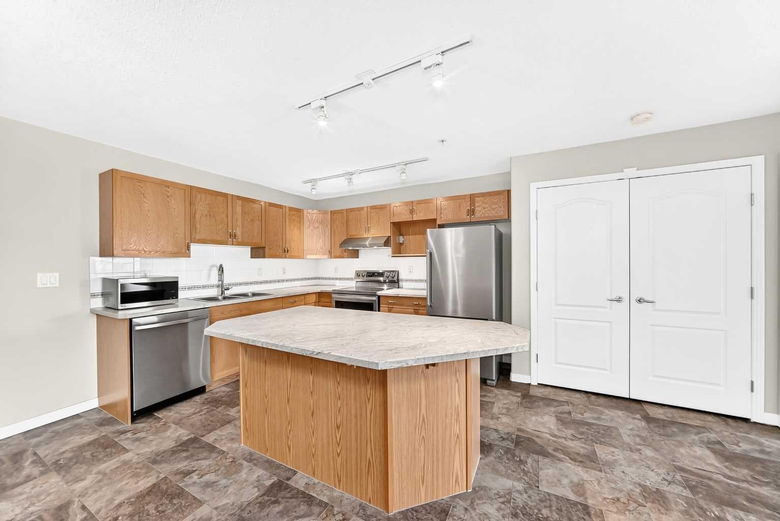 2215, 303 Arbour Crest Drive NW