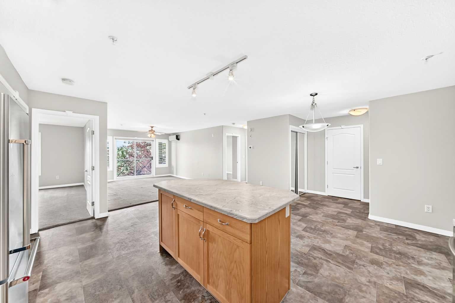 2215, 303 Arbour Crest Drive NW