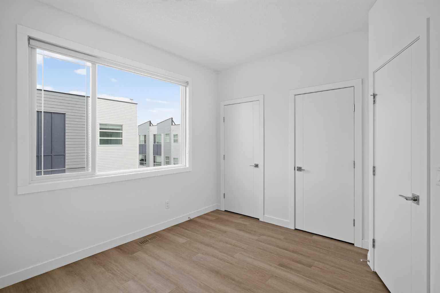 202, 101 Panatella Square NW