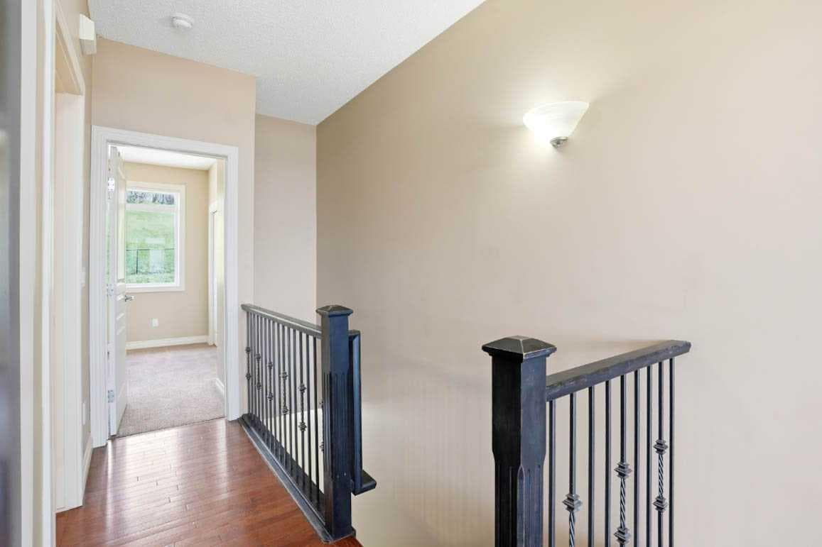 11, 148 Rockyledge View NW