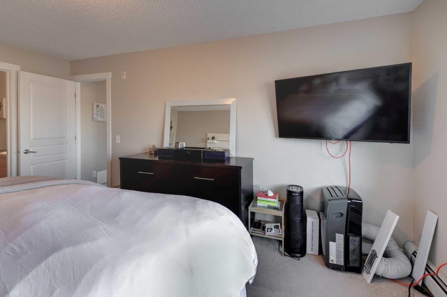 1203, 211 Aspen Stone Boulevard SW
