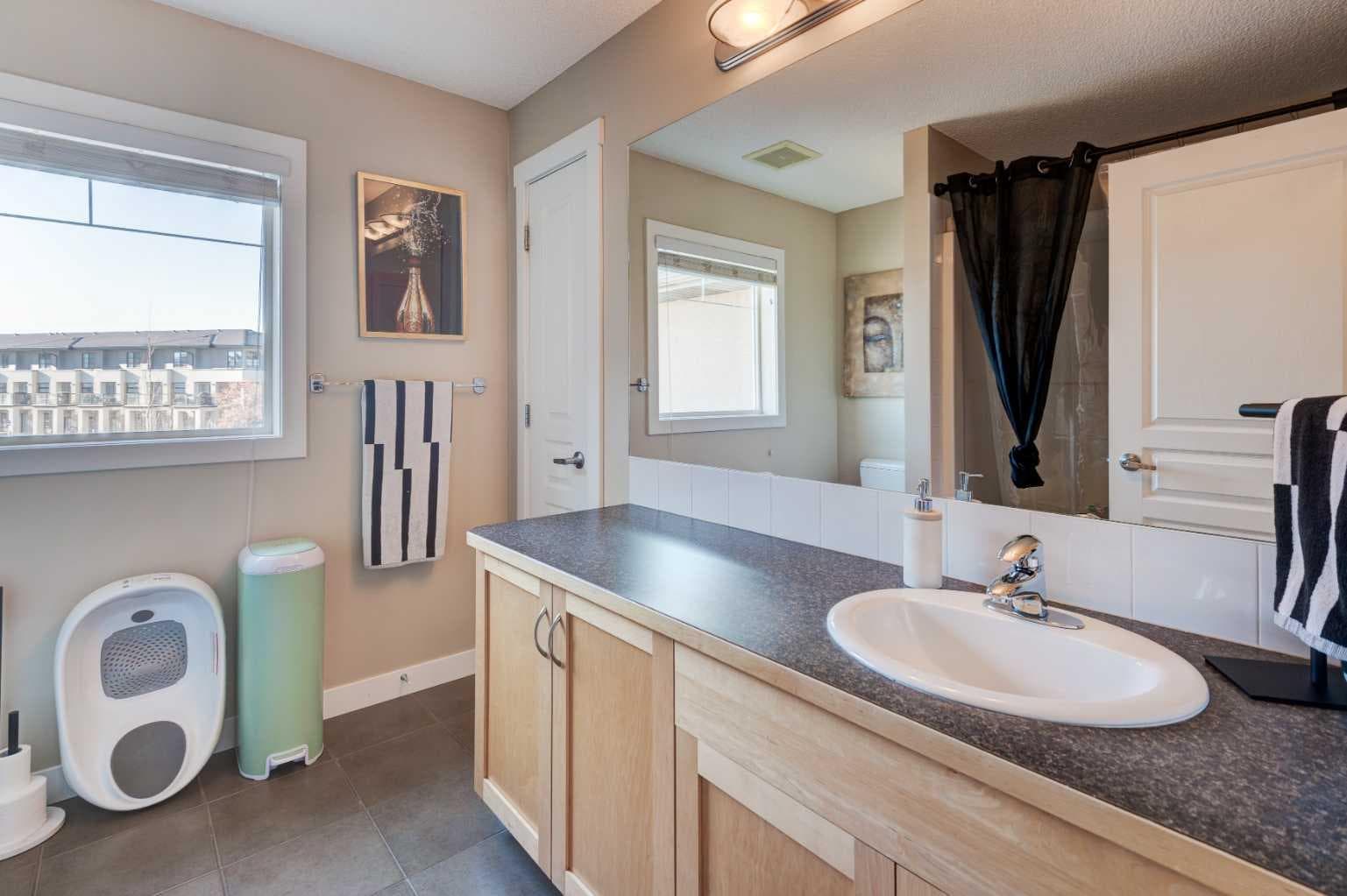 1203, 211 Aspen Stone Boulevard SW