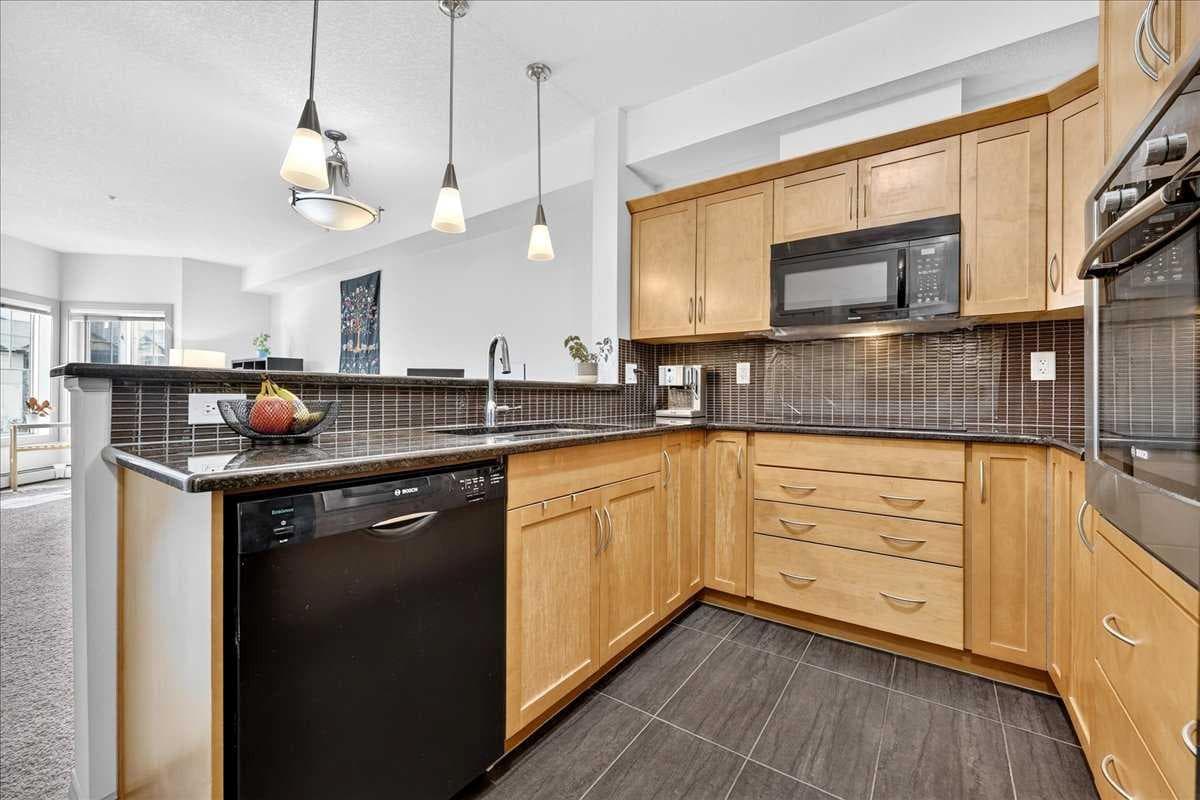 303, 70 Royal Oak Plaza NW