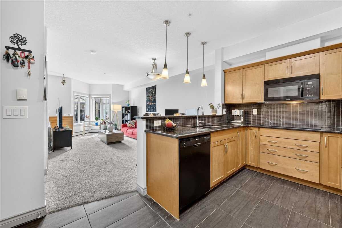 303, 70 Royal Oak Plaza NW