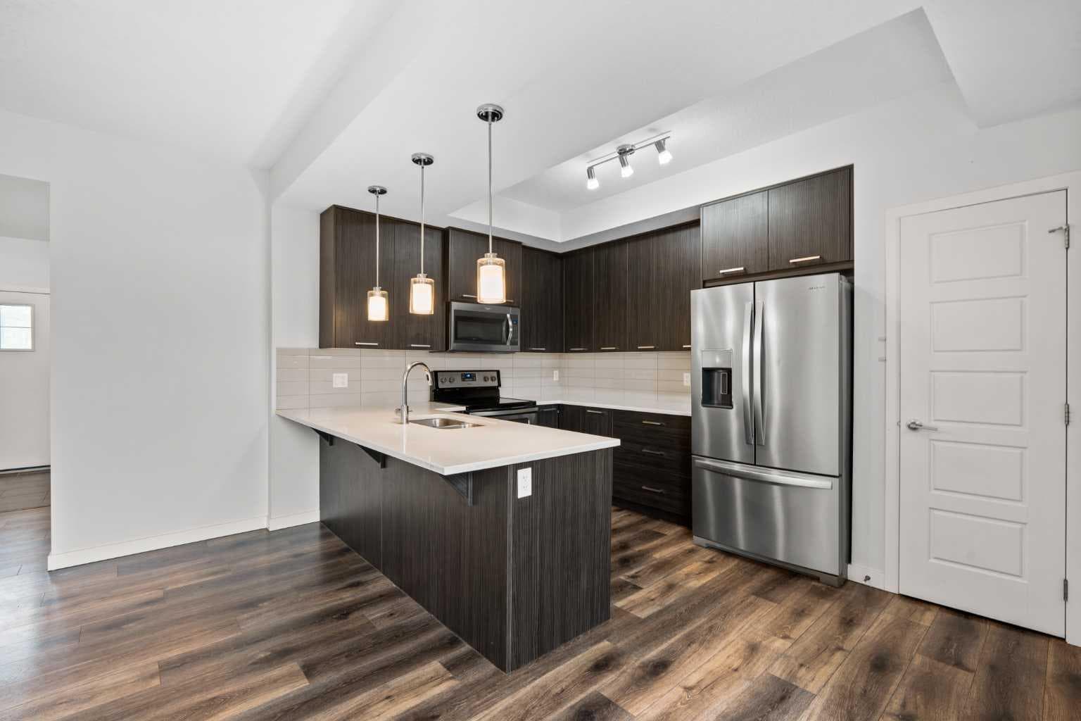103, 115 Sagewood Drive SW