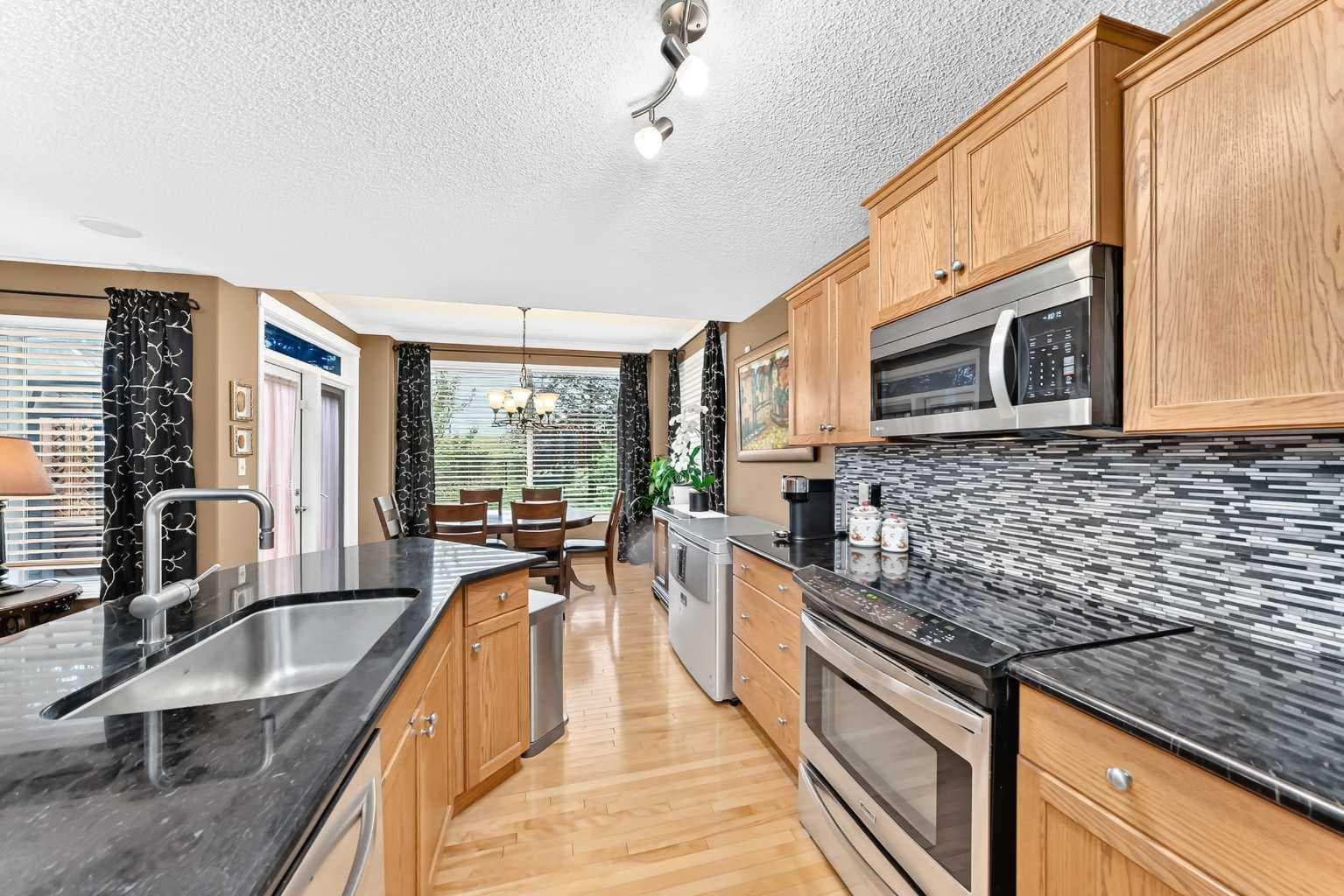 144 Cougarstone Common SW
