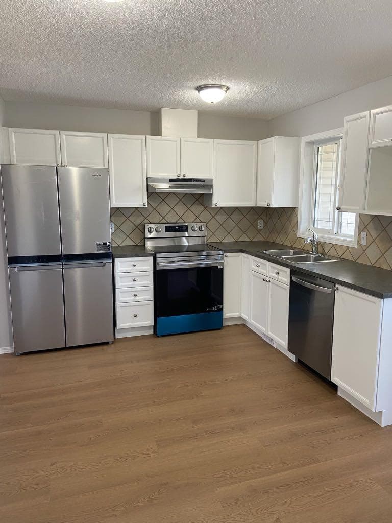 102, 950 Arbour Lake Road NW